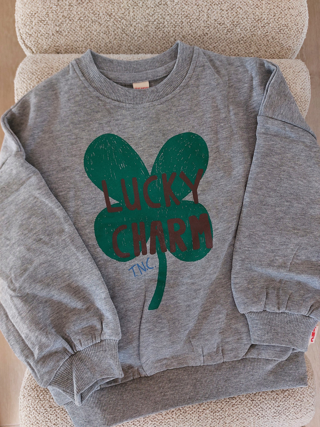 Sweater lucky charm