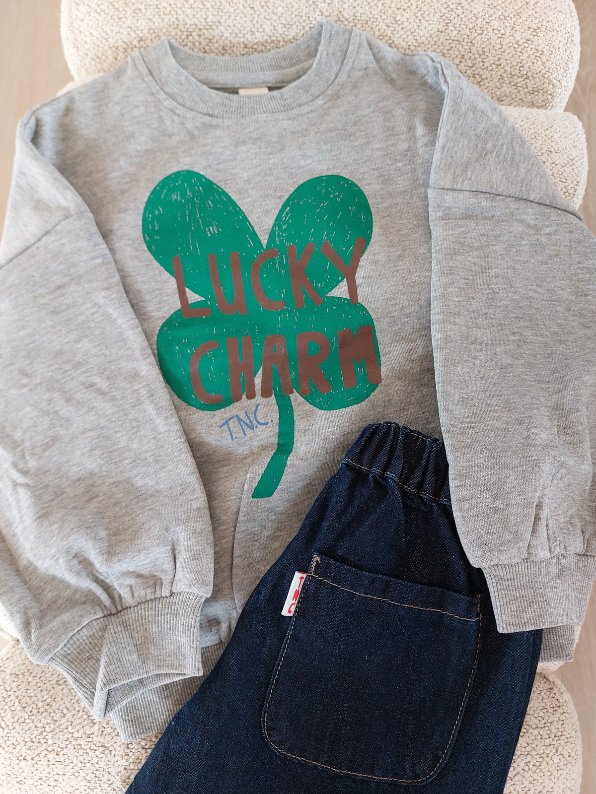 Sweater lucky charm