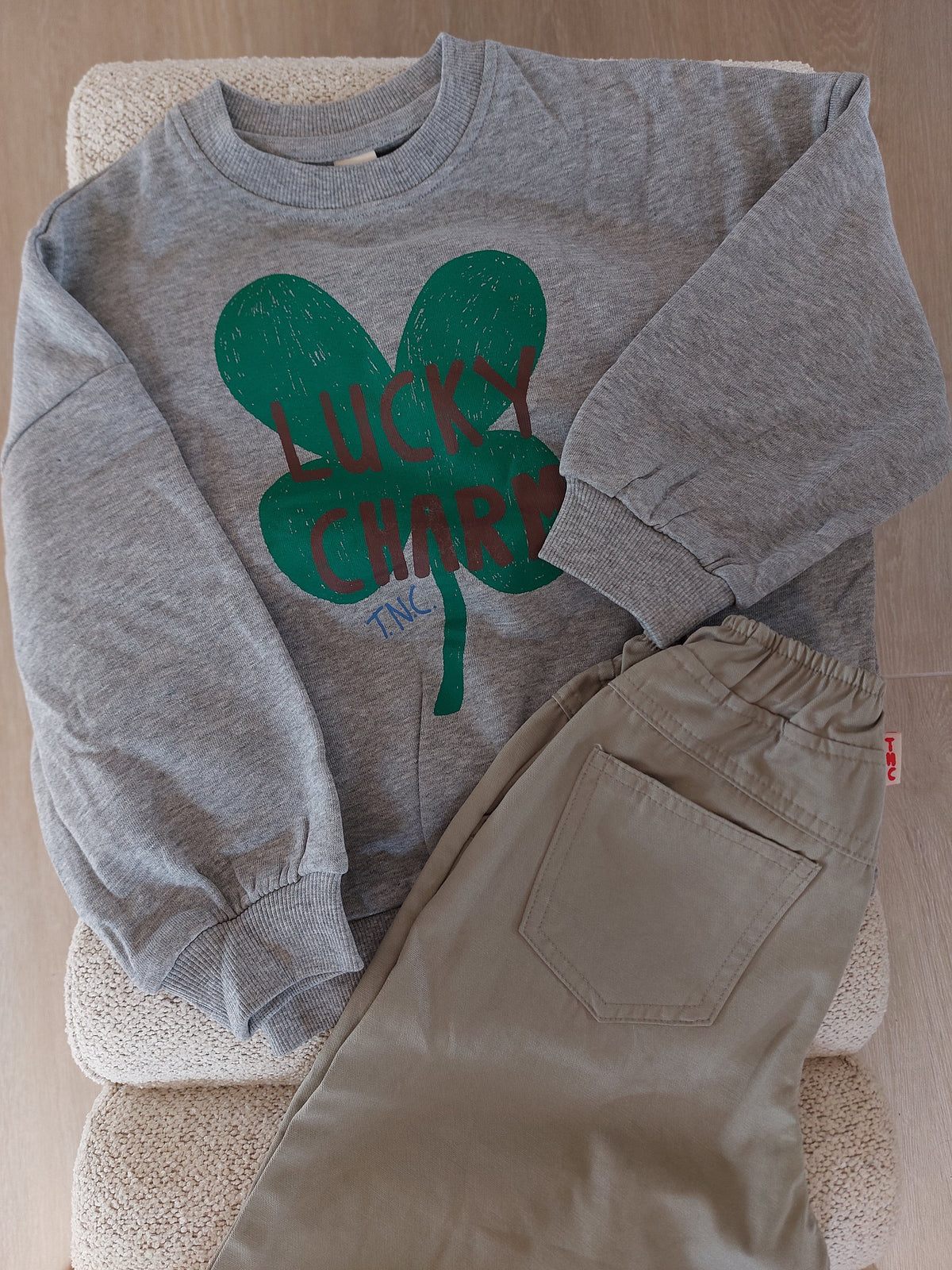 Sweater lucky charm